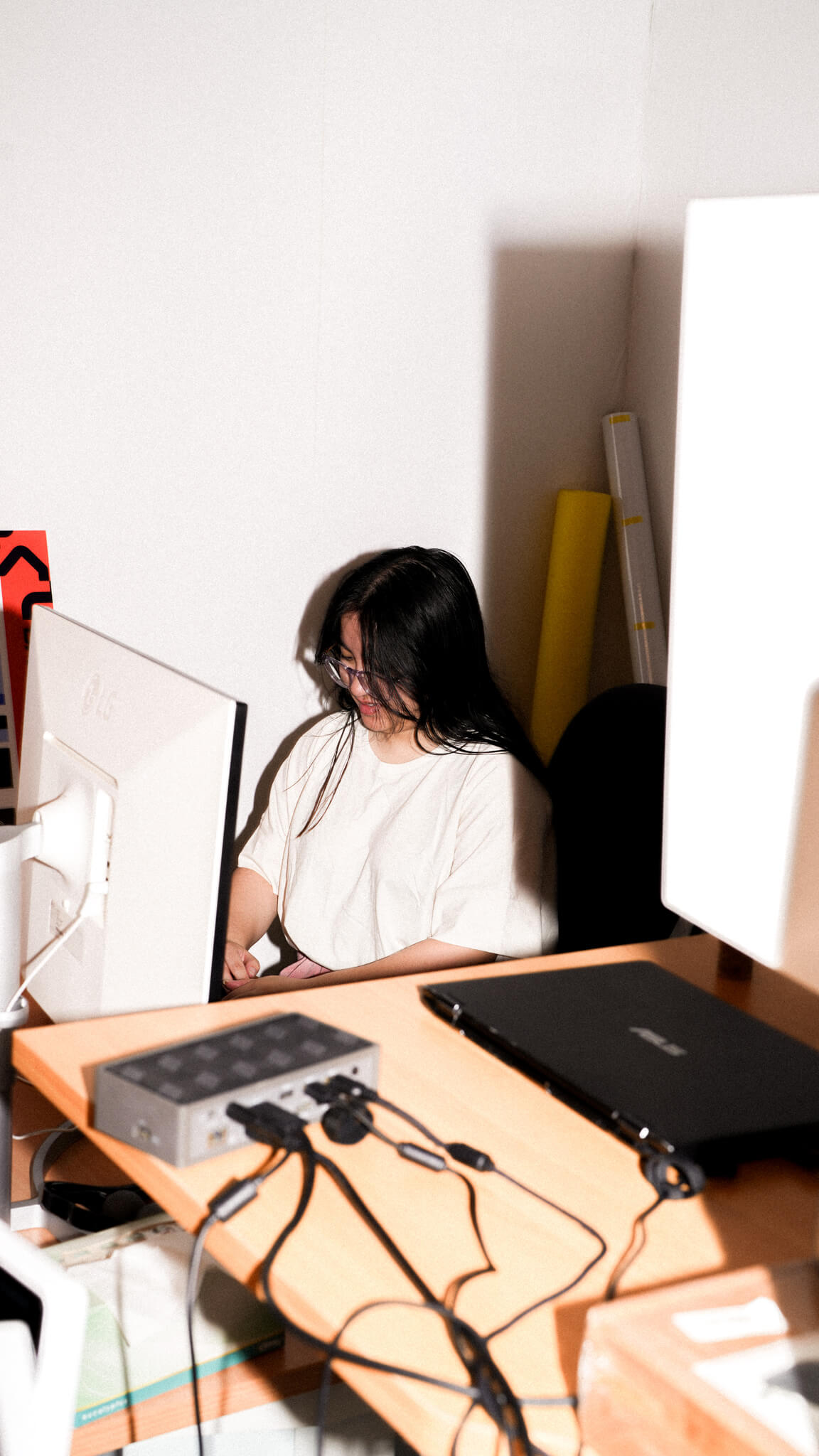 A Refuel Creative team member working at her desk.