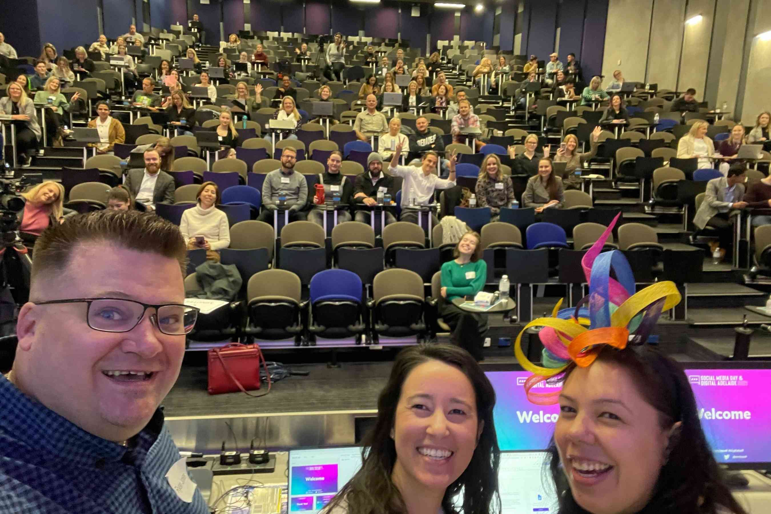 Ryan, Jen and Rubina at Social Media Day X Digital Adelaide 2021 with crowd in the background